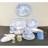 A quantity of blue and white china, including Victorian platters, cups, plates, etc.