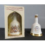 Two commemorative Bells Whisky bottles, with contents, one commemorating the Birth of William.