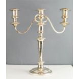 A silver plated three branch candleabra.