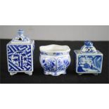 A group of Chinese blue and white jars and covers, and a dish.