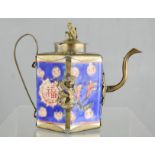 A 19th century Canton hexagonal enamelled teapot with antimony mounts of cast dragons, monkey and