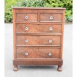 A Victorian mahogany chest of drawers, with two short over three long drawers, splits in the middle,