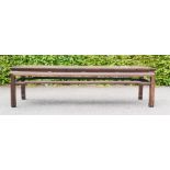 A Chinese low table, the long rectangular top above shaped sides and legs. 206 long, 58 high, 60