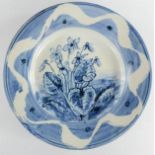 A signed Michael Francis studio bowl Cobalt oxide hand painted floral design and fish to the base,