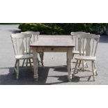 A painted pine kitchen table, with stained top, and four matching kitchen chairs