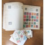 The Improved Postage stamp album, containing various stamps.