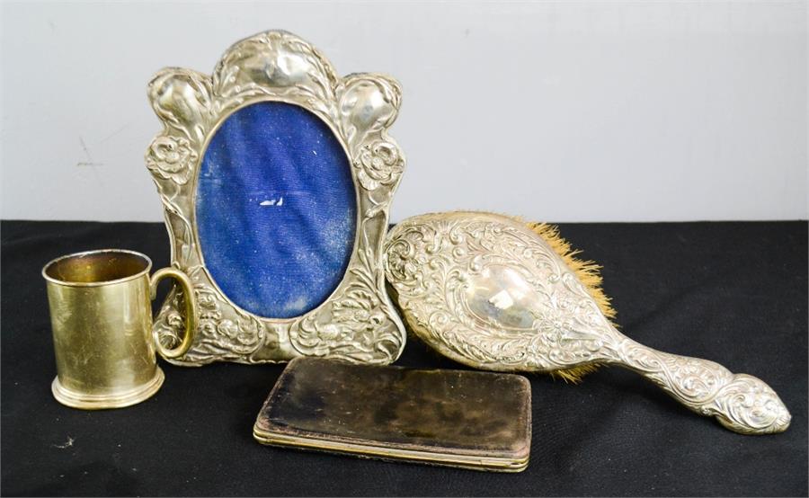 A silver hairbrush embossed with Art Nouveau style flowers and leaves, Birmingham 1906, a silver