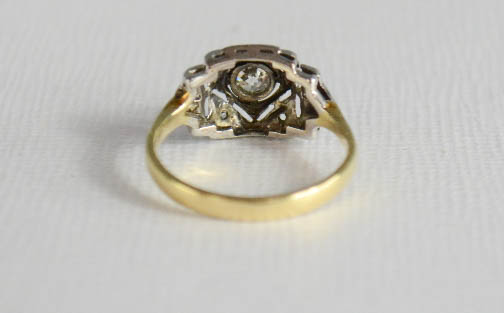 An early 20th century Art Deco style ring with central diamond, set in platinum setting, on an - Image 5 of 5