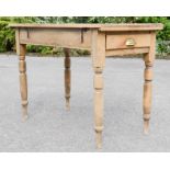 A small pine antique kitchen/side table, with single drawers, 76 by 107 by 57cm.