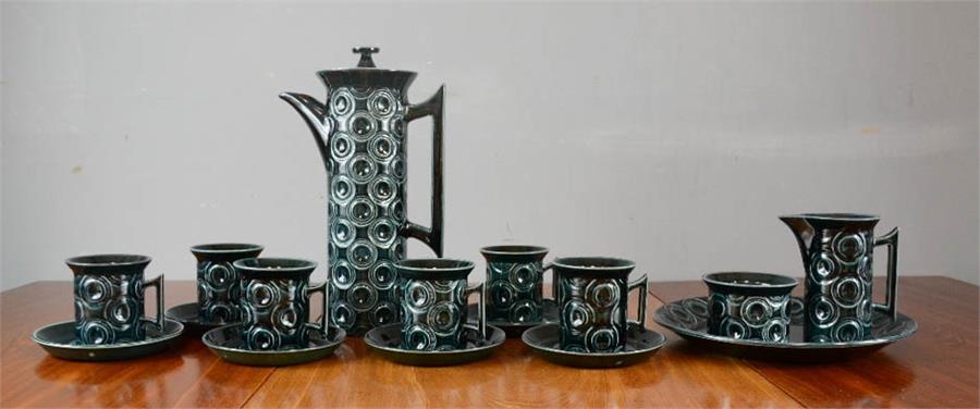 A Portmerion Susan Williams-Ellis coffee set comprising coffee pot, six coffee cans and saucers, a