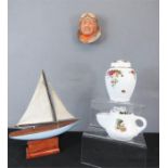 Royal Albert ceramics, a shaving mug, pilot wall hanging and a model boat.