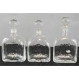 Three Dartington glass decanters with stoppers circa 1975.
