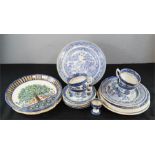 A group of blue and white ceramics including Booths Real Old Willow Pattern cups and saucers.
