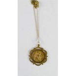 A 9ct gold St Christopher pendant and chain, 9g.