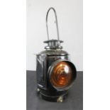 An antique railway lamp.