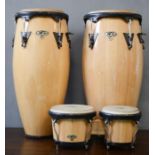A bongo set; two large, and one double bongo.