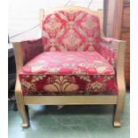 A giltwood armchair, red upholstered.