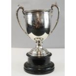 A silver trophy Birmingham 1922, raised on an ebonised plinth, 10.01toz.