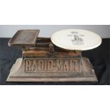 A Radio-Malt set of scales together with a corresponding plaque; Day & Millnard Patentees,