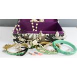 A quantity of costume jewellery, with jewellery box, to include three malachite bangles, simulated