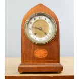 A mahogany mantle clock, marquetry oval, Arabic dial, 27cm high.