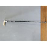 A silver and ivory 19th century walking cane.