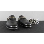 A pair of Tom Ford black shoes, with shoe bag, size 9.