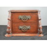 A Victorian table set of two drawers, with carved front brackets., 20 by 30 by 25cm.