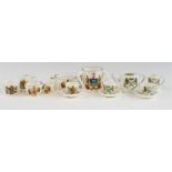 A group of miniature Crestware, including part tea services and Sheffield loving cup.