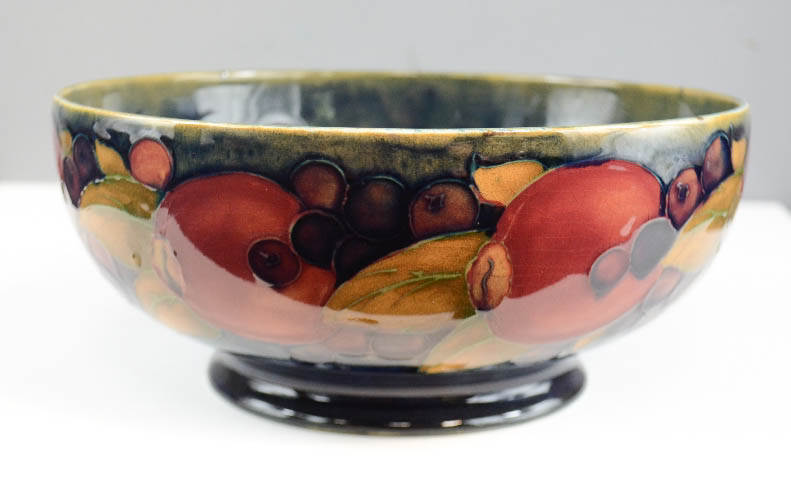 A Moorcroft bowl circa 1919, Pomegranate, impressed to the base, signed William Moorcroft. 21cm