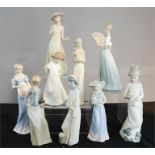 A group of nine Nao Lladro and other figurines.