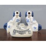 A pair of Blue Staffordshire type dogs and Doulton hot water bottle.