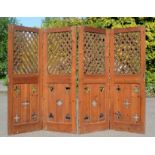 A pair of pitch pine panels, with oak lattice form upper panels, and lower panels bearing pierced