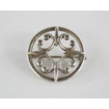 A vintage Ola Marie Gorie sterling silver brooch, wishbone pattern.