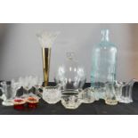 A glass closhe, a glass 'Poison' bottle, an eperne, and various other glassware.