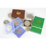 A quantity of commemorative coins including a Perth Mint Medallion.