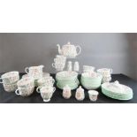 A Minton Haddon Hall part dinner service comprising 12 cups, 12 saucers, 8 plates 20cm diameter, 7