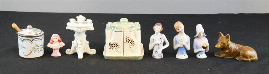 A group of ceramic doll tops, a continental cruet set, a French mustard pot, etc.