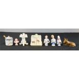 A group of ceramic doll tops, a continental cruet set, a French mustard pot, etc.