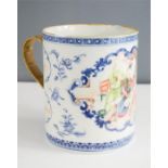 A 19th century Chinese mug, hand painted with a figural scene.