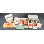 A quantity of sewing implements and accessories, including buttons, cotton reels etc.