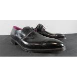 A pair of black patent gents shoes by El Burgues, size 10.