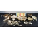 A group of silver plateware to include Butlers Table cutlery in original box, jug and slop bowl,