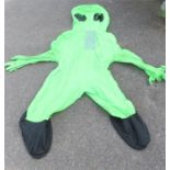 A large inflatable green alien.