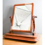 A Victorian mahogany toilet mirror.