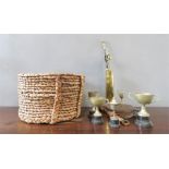 A rush woven log basket together with bellows, brass fire irons etc.