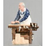 A Royal Doulton HN 2678 The Carpenter figure.