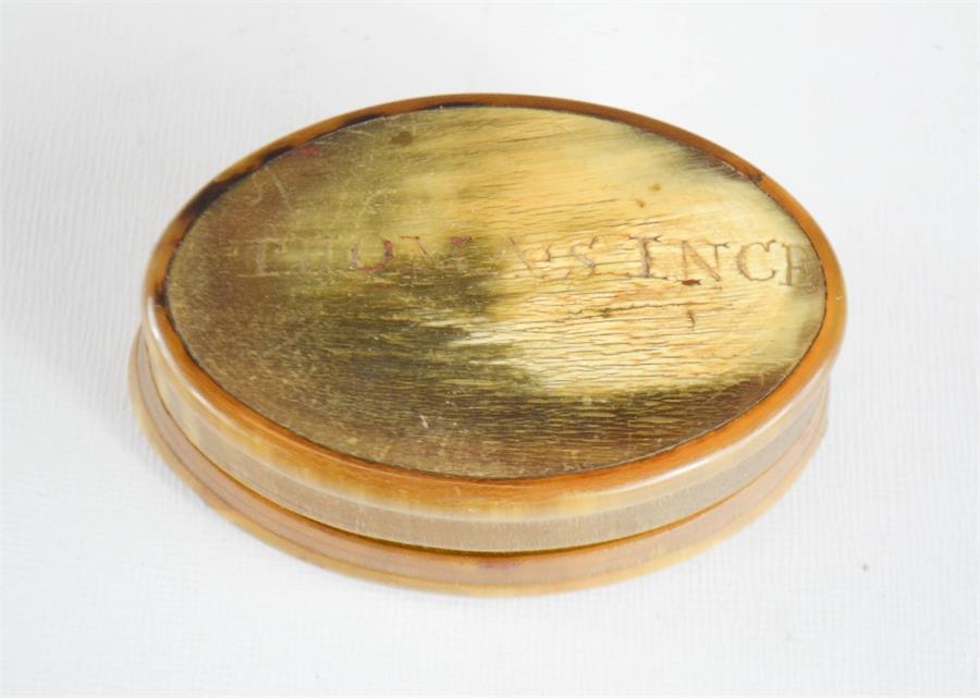 A 19th century horn snuff box, engraved Thomas Ince, oval form.