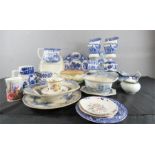 A quantity of blue and white ceramics, including Victorian jugs, plates, sugar bowls, and a H M &