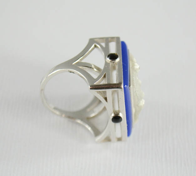 A Lalique Art Deco silver and crystal Masque Du Femme ring, bordered by blue enamel piping with - Image 7 of 9